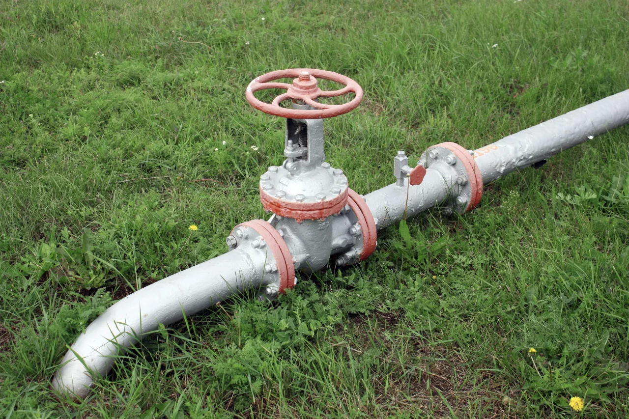gas-pipe-line-and-valve-that-laid-through-green-fi-2022-08-11-20-32-59-utc